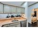 Kitchen area with granite counters, stainless appliances, and convenient access to the living room at 2499 Peachtree Ne Rd # 108, Atlanta, GA 30305
