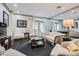 Bright living room with neutral tones, plush seating, and views to the outside at 2499 Peachtree Ne Rd # 108, Atlanta, GA 30305