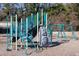 A colorful playground featuring a slide, climbing structures, and swings, perfect for outdoor fun at 2499 Peachtree Ne Rd # 108, Atlanta, GA 30305