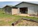 View of the barn with the shed attached and partial opening to interior at 255 Henson Way, Canton, GA 30115