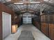 Inside the barn with wooden stalls, metal accents, and open ceiling at 255 Henson Way, Canton, GA 30115