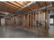 Unfinished basement featuring concrete floors, exposed ductwork, and open layout, ideal for future expansion at 255 Henson Way, Canton, GA 30115