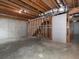 Unfinished basement featuring concrete floors, exposed ductwork, and open layout, perfect for customization at 255 Henson Way, Canton, GA 30115