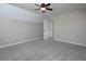 Light bedroom features neutral walls, carpet, closet, natural light, and a ceiling fan at 255 Henson Way, Canton, GA 30115