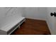 Walk-in closet with built-in shelving and a bench for comfortable organization at 255 Henson Way, Canton, GA 30115
