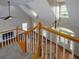 Elegant foyer featuring hardwood floors, a staircase with white spindles, and a beautiful chandelier at 255 Henson Way, Canton, GA 30115