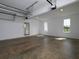 Spacious garage with high ceilings, lots of natural light and ample room for storage at 255 Henson Way, Canton, GA 30115