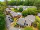 Aerial view of the property with a swimming pool and well-maintained landscaping at 1140 Moorestown Cir, Decatur, GA 30033