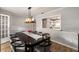 This dining room features a large table, chairs, and a view of the kitchen at 1140 Moorestown Cir, Decatur, GA 30033
