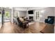 Spacious living room with a fireplace, hardwood floors, and an open entryway at 1140 Moorestown Cir, Decatur, GA 30033