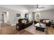Inviting living room with leather seating, hardwood floors, and stylish decor at 1140 Moorestown Cir, Decatur, GA 30033