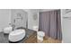 Bathroom featuring modern vessel sink, dark countertops, and updated fixtures at 1990 Cooper Lakes Dr, Grayson, GA 30017
