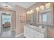 Charming bathroom features a marble countertop and tiled floor at 1990 Cooper Lakes Dr, Grayson, GA 30017