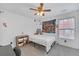 Bedroom featuring a ceiling fan, storage, and natural light at 1990 Cooper Lakes Dr, Grayson, GA 30017