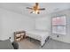 Simple spare bedroom with plenty of sunlight and ceiling fan at 1990 Cooper Lakes Dr, Grayson, GA 30017
