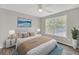 Bright bedroom with large window, hardwood floors, and stylish modern furniture at 1990 Cooper Lakes Dr, Grayson, GA 30017