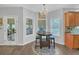 Cozy breakfast nook with a charming chandelier and views of the backyard at 1990 Cooper Lakes Dr, Grayson, GA 30017
