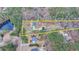 An aerial view outlining the property lines of a home with pond access, showcasing its expansive land at 2885 Green Rd, Loganville, GA 30052
