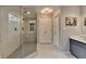 Bright bathroom featuring glass enclosed shower and built in shelving at 2885 Green Rd, Loganville, GA 30052