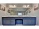 Bright bathroom featuring double sinks, large mirror and walk in shower at 2885 Green Rd, Loganville, GA 30052