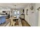 Inviting dining room with access to the kitchen and outdoor views at 2885 Green Rd, Loganville, GA 30052