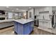 Modern kitchen with large island overlooking living space at 2885 Green Rd, Loganville, GA 30052