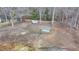 Picturesque lot featuring a trailer, trampoline, natural landscape, and perimeter fence for privacy and security at 2885 Green Rd, Loganville, GA 30052