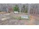 Pasture featuring metal fencing and gate, with trailer at 2885 Green Rd, Loganville, GA 30052