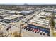 Overhead view of a vibrant commercial district, showcasing storefronts and street parking on a sunny day at 4178 Castle Pines Ct, Tucker, GA 30084