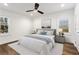 Serene bedroom with hardwood floors, neutral decor, ample natural light, and a cozy, inviting atmosphere for relaxation at 4178 Castle Pines Ct, Tucker, GA 30084