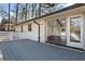 View of the deck leading to an open living space through sliding glass doors at 4178 Castle Pines Ct, Tucker, GA 30084