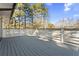 Spacious deck perfect for outdoor entertaining, painted gray with white railings at 4178 Castle Pines Ct, Tucker, GA 30084