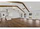 Spacious living room with vaulted ceiling, wooden beams, and hardwood floors at 4178 Castle Pines Ct, Tucker, GA 30084