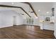 Open-concept living space with hardwood floors and an eat-in kitchen at 4178 Castle Pines Ct, Tucker, GA 30084