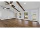 Bright living room with hardwood floors and a modern front door at 4178 Castle Pines Ct, Tucker, GA 30084
