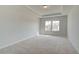 Neutral bedroom with carpeting, natural light, and traditional finishes at 612 Sidney Ct, Stockbridge, GA 30281