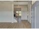 Inviting foyer with hardwood floors, paneled walls, and staircase with iron railings at 612 Sidney Ct, Stockbridge, GA 30281