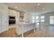 Kitchen featuring stainless appliances, central island, and easy access to outdoors at 612 Sidney Ct, Stockbridge, GA 30281