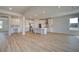 Gourmet kitchen with white cabinets, island with bar seating, and stainless steel appliances at 612 Sidney Ct, Stockbridge, GA 30281