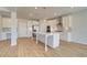 Bright kitchen with a central island, stainless steel appliances, and stylish pendant lighting at 612 Sidney Ct, Stockbridge, GA 30281