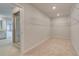 Large walk-in closet with shelving and rod storage; leads to main bathroom and bedroom at 612 Sidney Ct, Stockbridge, GA 30281