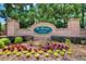 Charming entrance to The Heritage at Grayson, adorned with colorful flowers at 737 Heritage Post Ln, Grayson, GA 30017