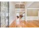 Open foyer with hardwood floors, soaring ceilings, and a staircase leading to the second floor at 737 Heritage Post Ln, Grayson, GA 30017