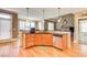 Kitchen featuring granite countertops, stainless steel appliances, and hardwood floors at 737 Heritage Post Ln, Grayson, GA 30017