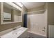 Well-lit bathroom with a single vanity and a shower-tub combo at 772 Vinings Estates Se Dr, Mableton, GA 30126