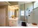 Bright bathroom featuring a large shower, vanity and neutral paint at 772 Vinings Estates Se Dr, Mableton, GA 30126