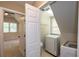 Convenient laundry room with modern washer and dryer units at 772 Vinings Estates Se Dr, Mableton, GA 30126