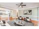 Open-concept living room showcasing hardwood floors and connection to the kitchen at 772 Vinings Estates Se Dr, Mableton, GA 30126