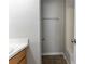 Modest bathroom featuring tile flooring, wood vanity, white walls and a shower and tub combo at 340 Onyx Ct, Atlanta, GA 30349