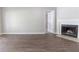 Inviting living room featuring modern fireplace, wood floors, and ample space for entertaining at 340 Onyx Ct, Atlanta, GA 30349